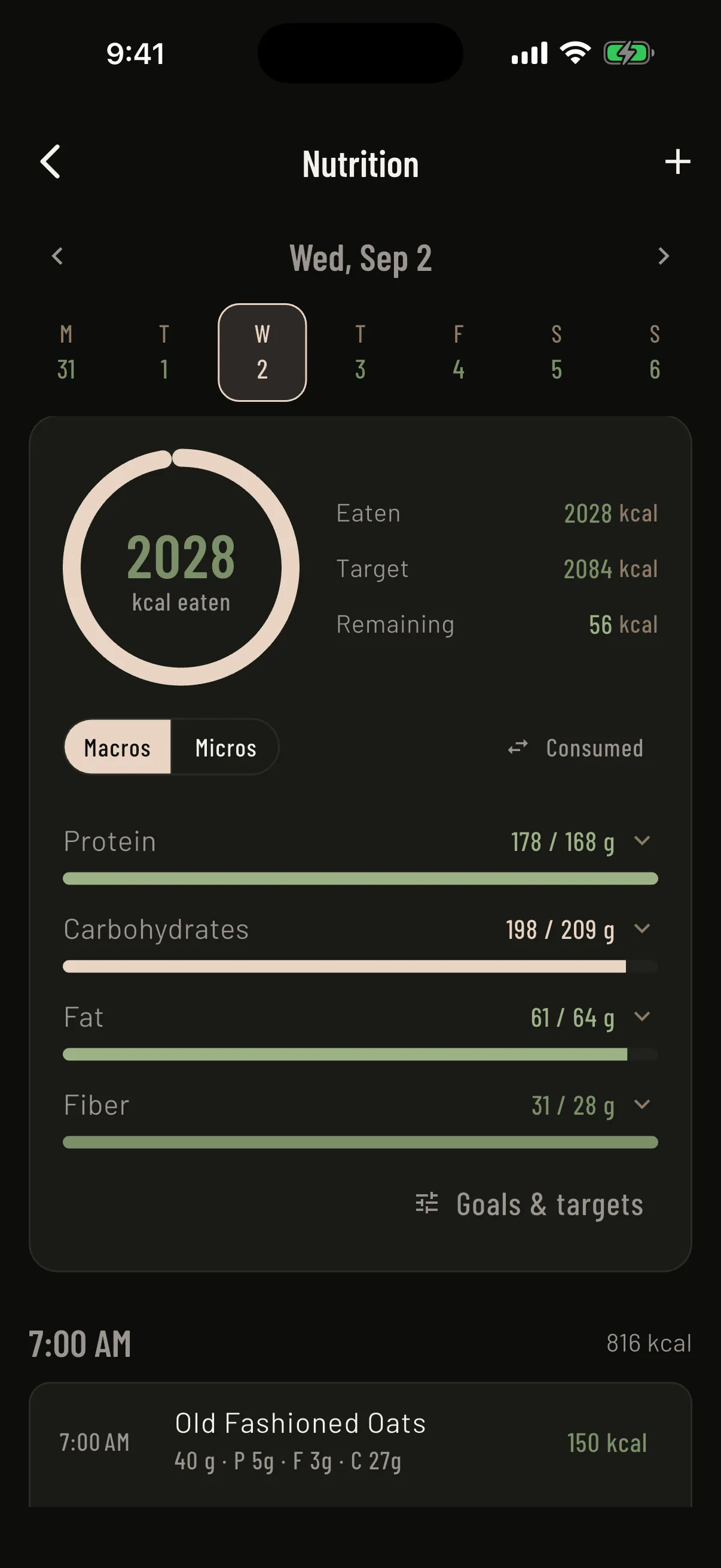 Mass in Motion nutrition day screen showing calories eaten against target with macro progress bars